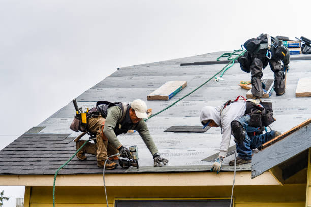 Professional Gutter Installation technician working in Keene, NH